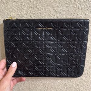 Comme des garçons clutch